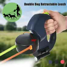 Double retractable dog leash with flashlight
